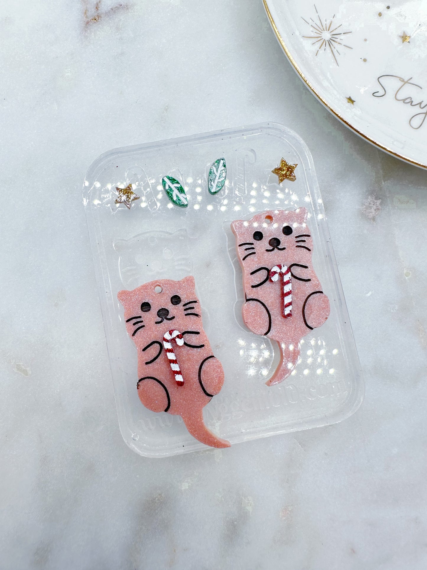 Autumn Sea Otter Dangle Earring with Christmas Candy Cane